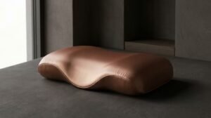 Specialized boutique anti-wrinkle pillow with ergonomic contouring for sleep-tech manufacturing